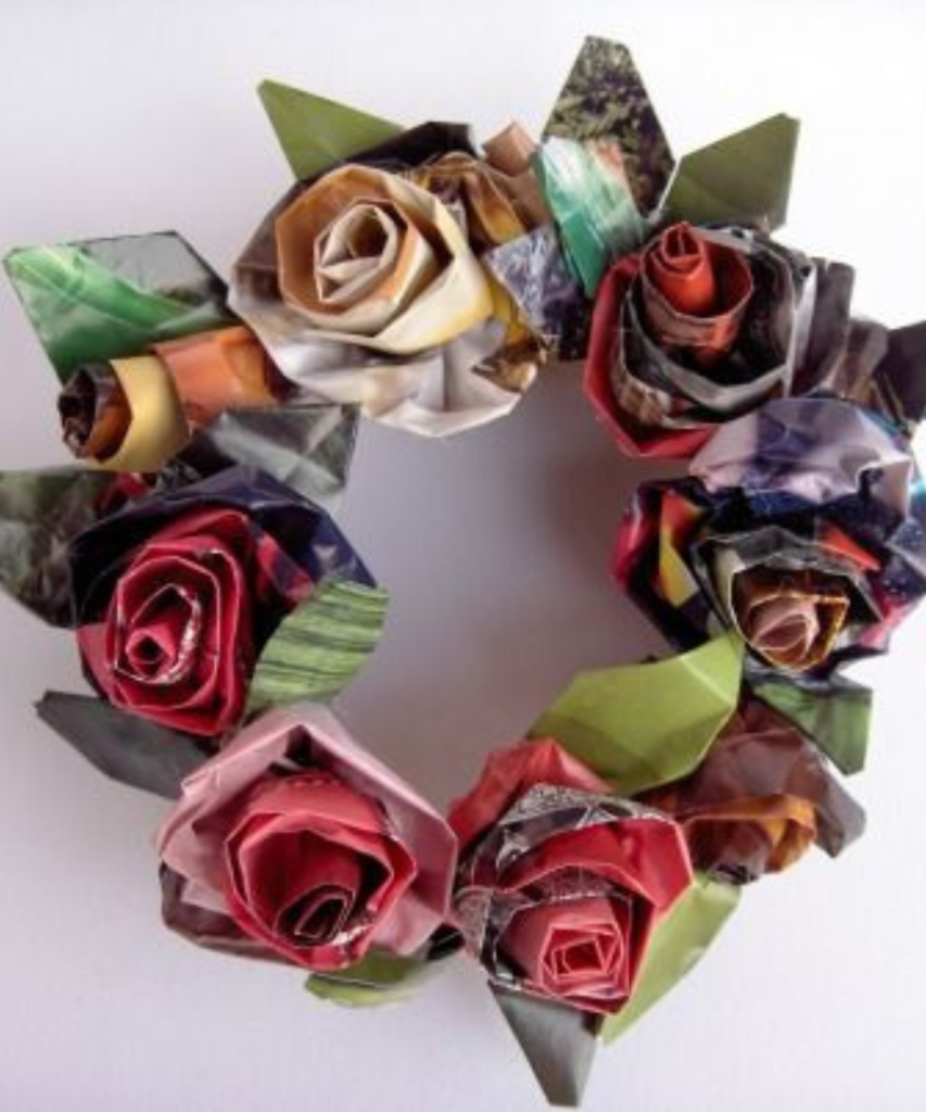 Making paper flowers from old magazines.art and craft